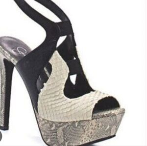 Jessica Simpson Elegant Black and Cream Platform Heels